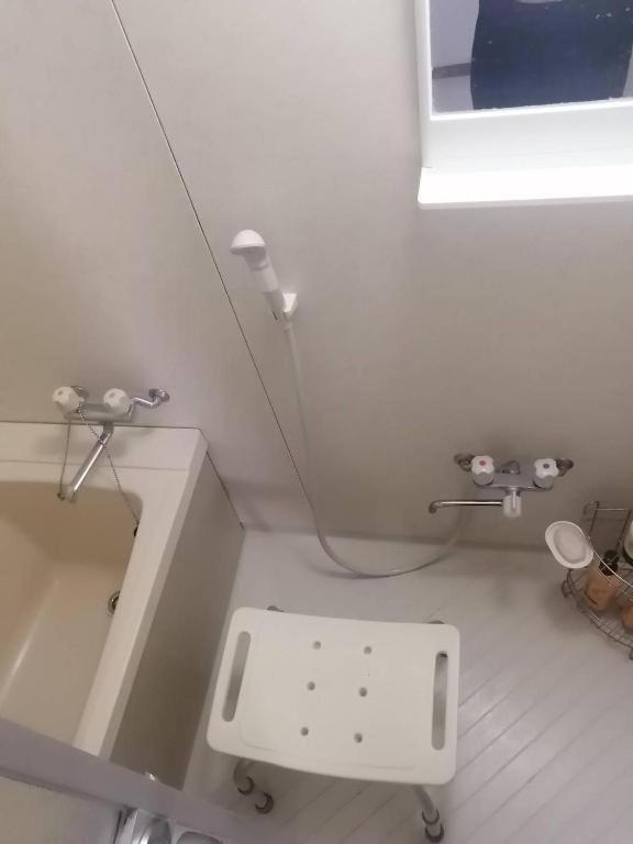 Quarto em Acomodações Particulares Tokayo Downtown *
