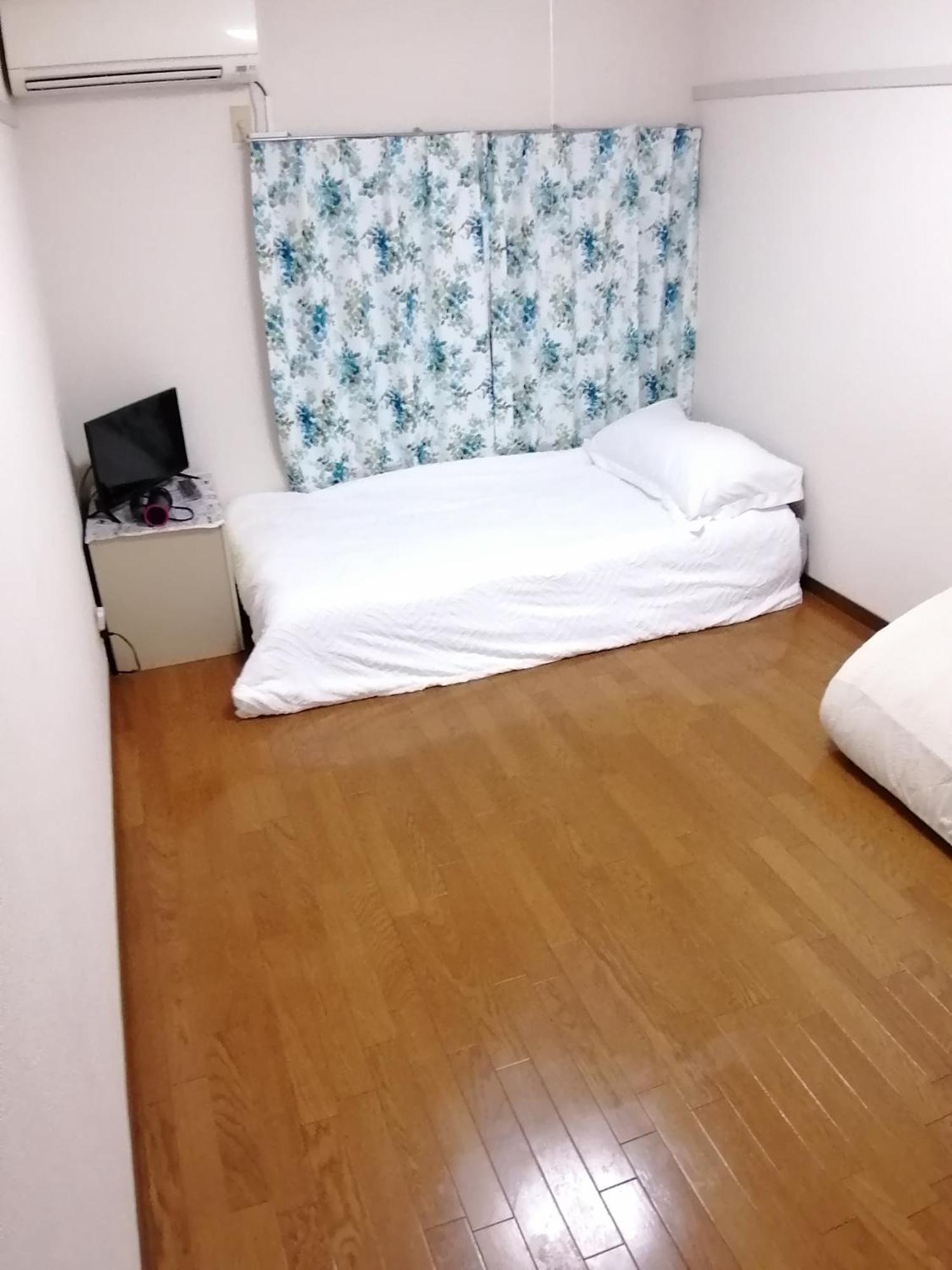 Quarto em Acomodações Particulares Tokayo Downtown