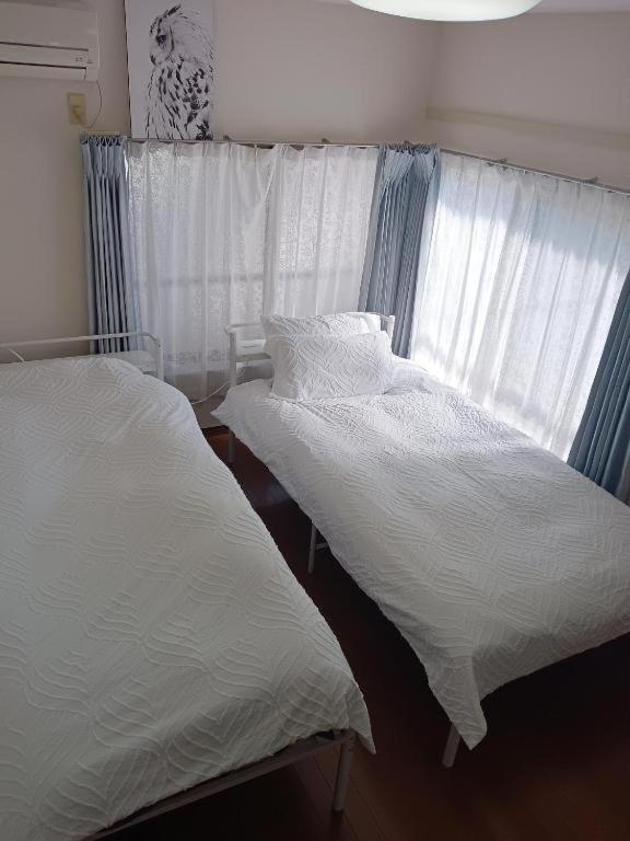 Quarto em Acomodações Particulares Tokayo Downtown *